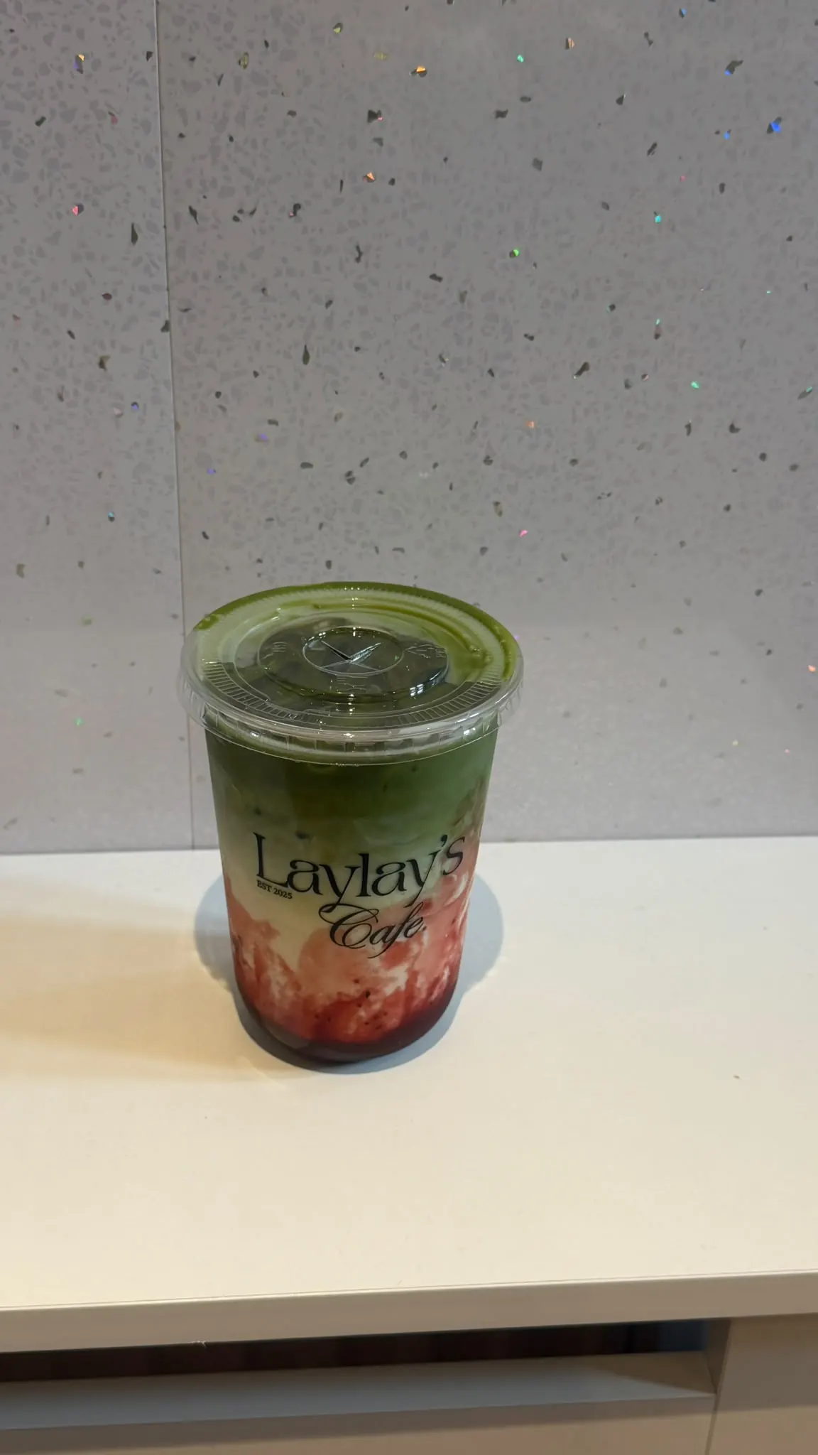 Layered strawberry matcha in a Laylays cup